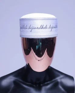 A cocaine white grey scritto pattered embroidery hat