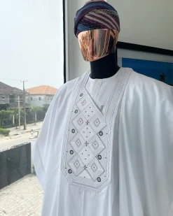 A Cocaine white, Square dropping-layered embroidery design details agbada