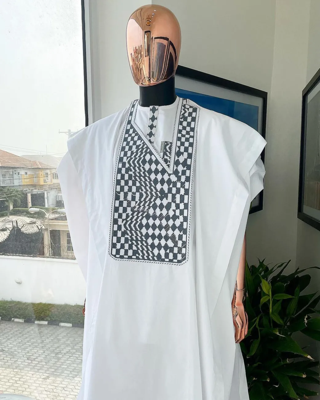 A Cocaine white, Square inter-layered 3D embroidery design details Agbada
