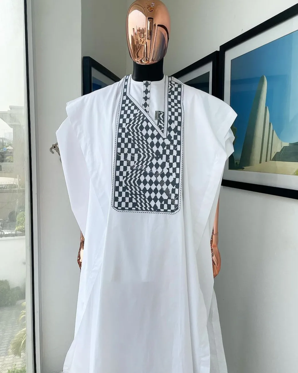 A Cocaine white, Square inter-layered 3D embroidery design details Agbada