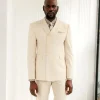 A Cream White, Wrap, Peak Lapel Jacket & Pant Trousers.