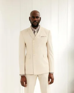 A Cream White, Wrap, Peak Lapel Jacket & Pant Trousers.
