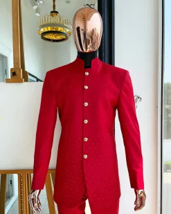 A Crimson red safari suit with matching Swarovski stones detailing