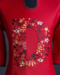 A Crimson red, U-shaped neck, letters floral, 3/4 sleeve embroidery detail African senator Kaftan.