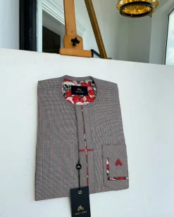 A Dark brown windowpane check, cross-details front flap, and sliding patch pocket African traditional kaftan native