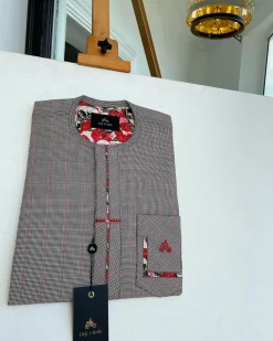 A Dark brown windowpane check, cross-details front flap, and sliding patch pocket African traditional kaftan native