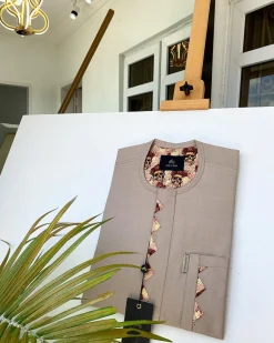 A Dark cream african kaftan With Paisley detailing