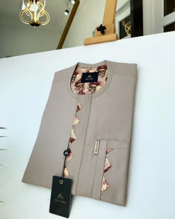 A Dark cream african kaftan With Paisley detailing