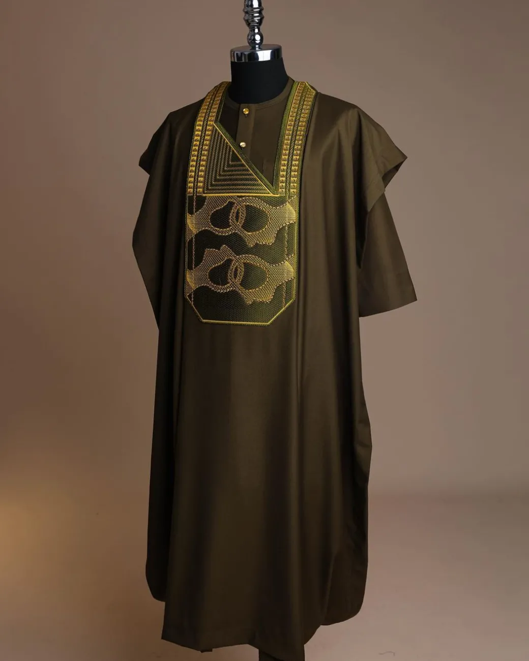 A Dark Olive Green, Connected Medulla And Wooven Pattern Embroidery Detailing Agbada