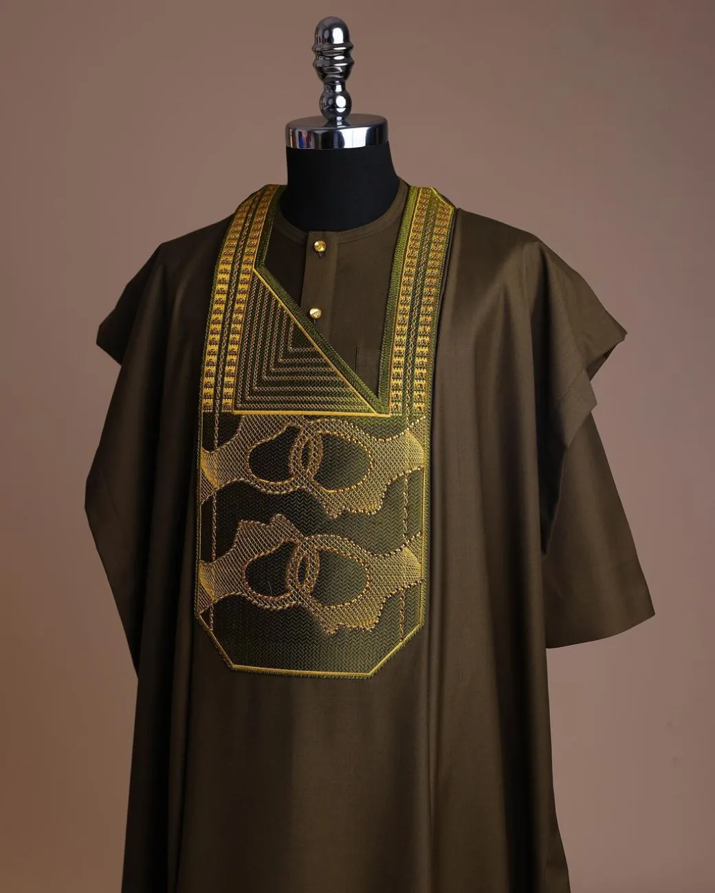 A Dark Olive Green, Connected Medulla And Wooven Pattern Embroidery Detailing Agbada