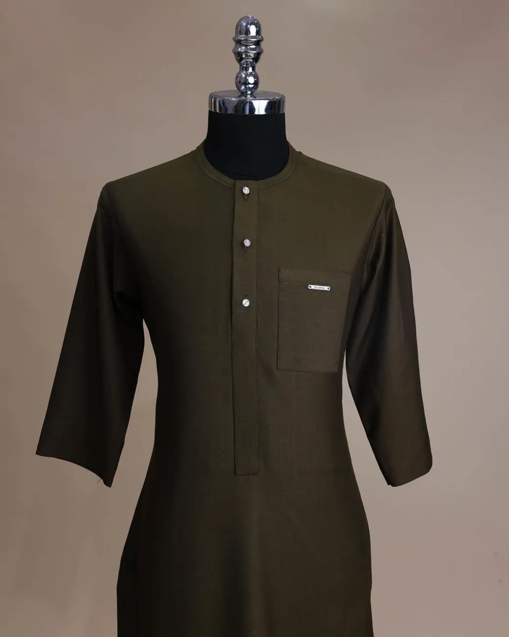 A Dark Olive Green, Connected Medulla And Wooven Pattern Embroidery Detailing Agbada