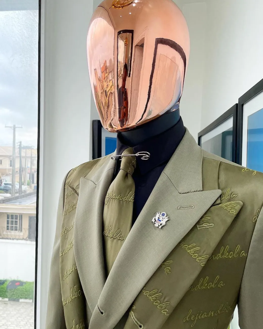 A Dark olive green “scritto” (inscribe your name), layered 4 lapels, double-breasted, out-waisted jointed jacket