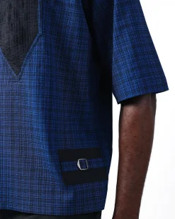 A Dark Skye blue and black Checkered, front pointed pleat, jet black studded Swarovski button, short sleeve, wide-cut casual shirt