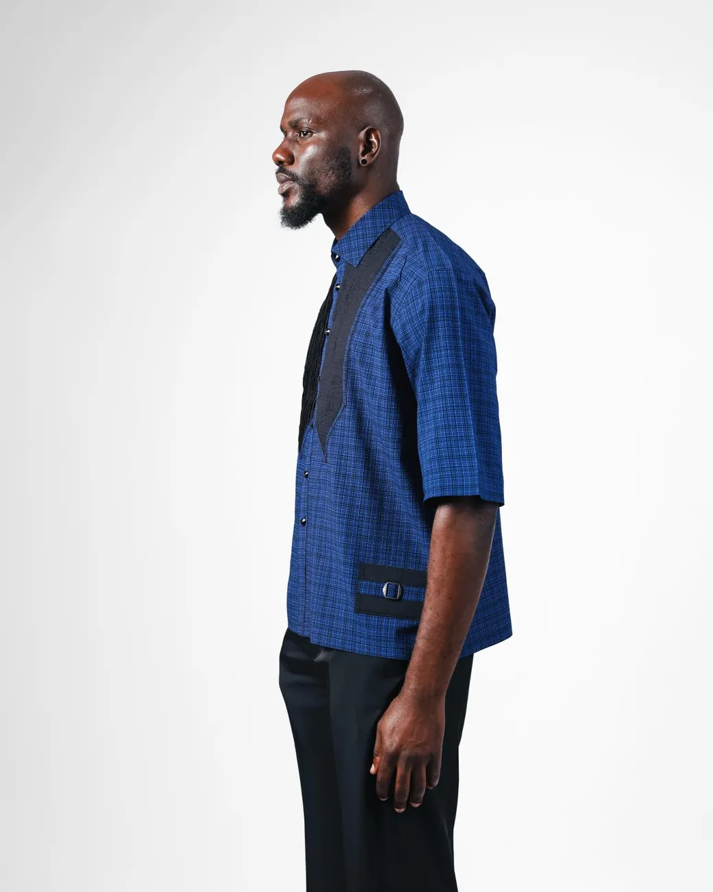 A Dark Skye blue and black Checkered, front pointed pleat, jet black studded Swarovski button, short sleeve, wide-cut casual shirt