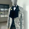 A dispersed silver and black pattern jacquard shawl lapel tuxedo suit