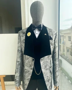 A dispersed silver and black pattern jacquard shawl lapel tuxedo suit