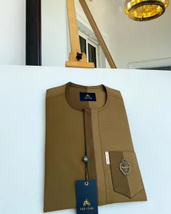 A Divided section of different shades of brown African senator kaftan