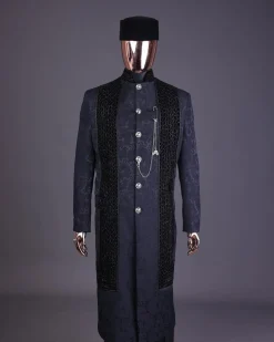 A floral midnight blue “wakanda” with L metallic embroidery, trench jacquard safari suit