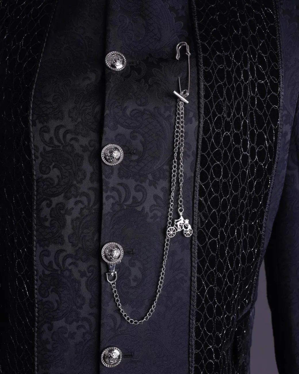 A floral midnight blue “wakanda” with L metallic embroidery, trench jacquard safari suit