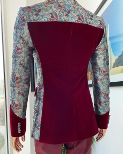 A floral paisley mahogamy red soaked Italian velvet peak lapel suit