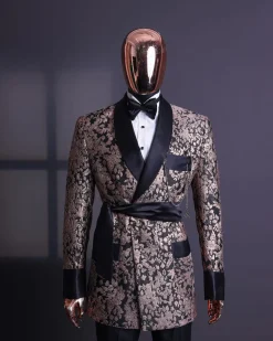 A Floral splashed pink metallic jacquard, shawl lapel wrap tuxedo suit