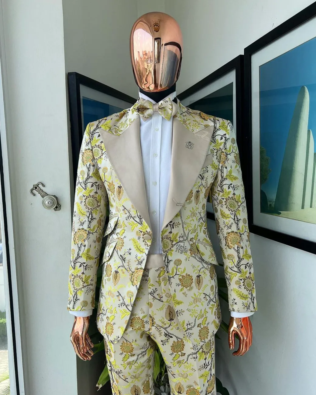 A Floral splashed yellow, mocha and cedar brown, knitted, peak lapel tuxedo suit