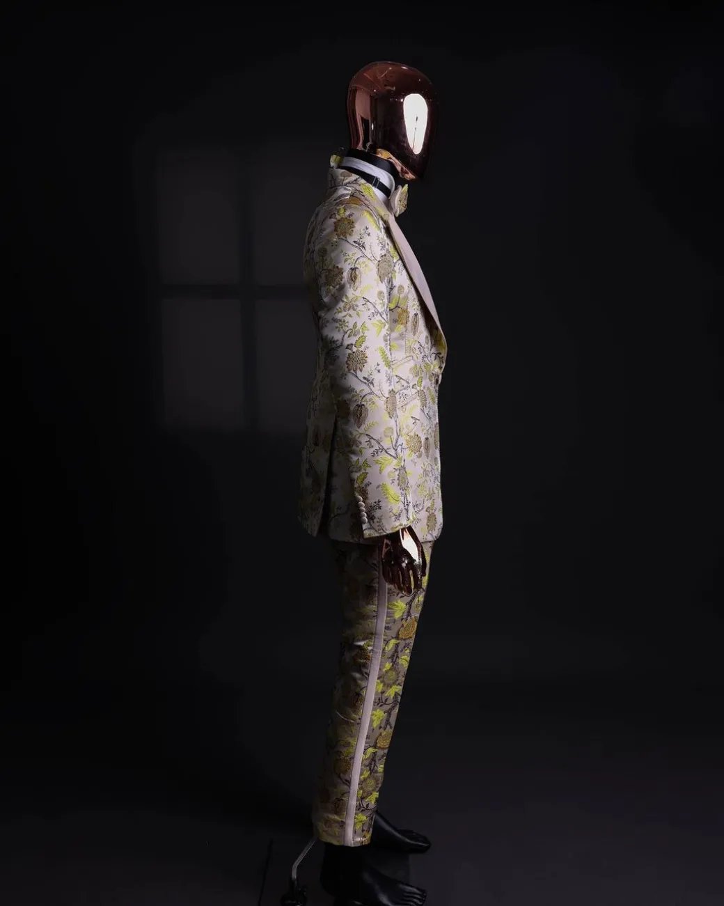 A Floral splashed yellow, mocha and cedar brown, knitted, peak lapel tuxedo suit