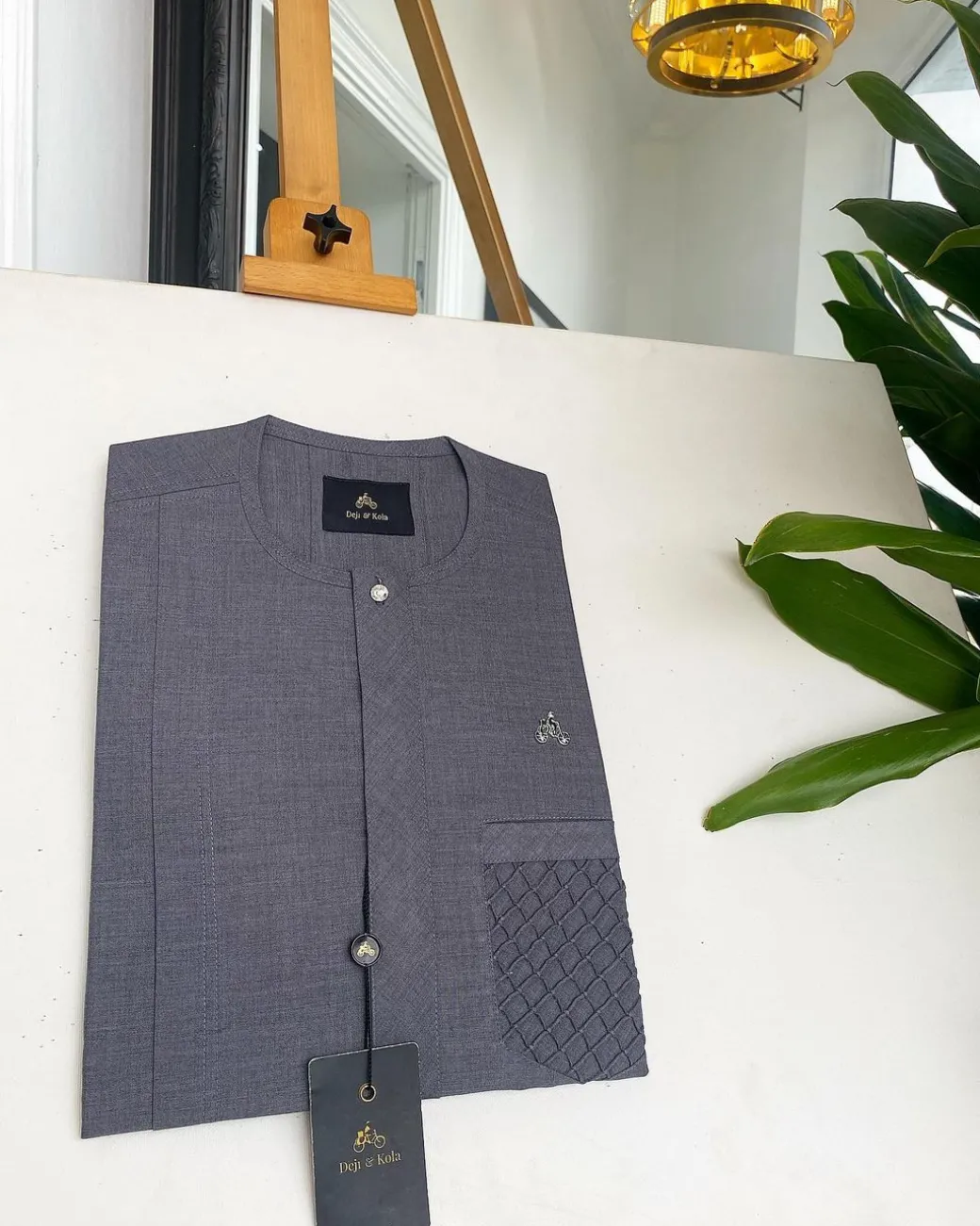A Fossil grey, clear view silver Swarovski buttons, ruffle pocket details African traditional senator kaftan native.