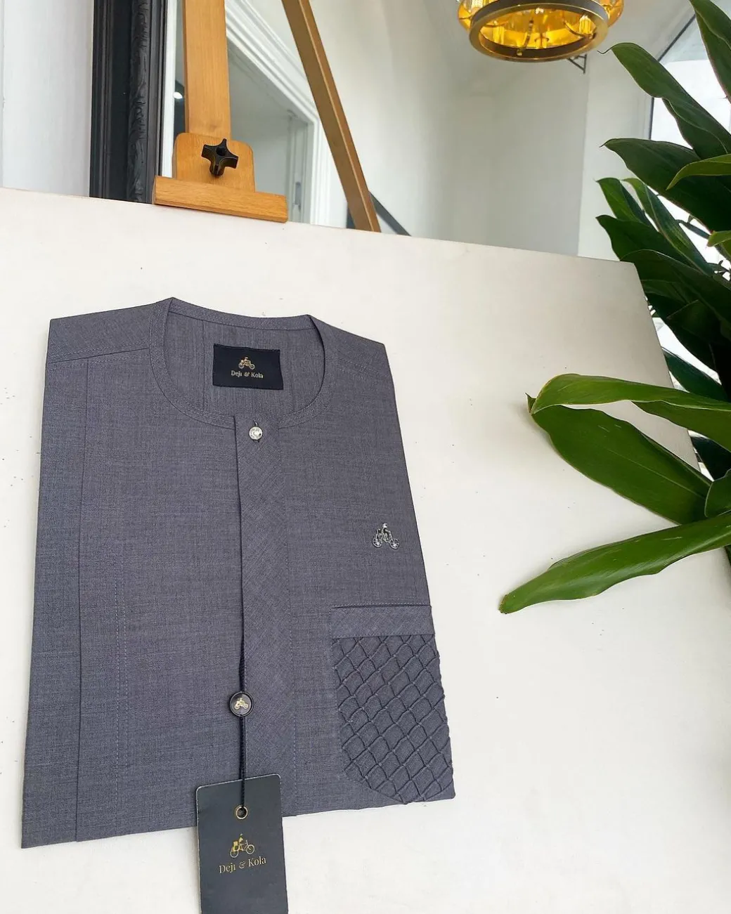 A Fossil grey, clear view silver Swarovski buttons, ruffle pocket details African traditional senator kaftan native.