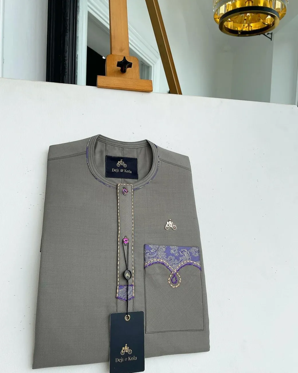 A Fossil Grey, mixed purple Swarovski buttons, vertical flap, knitted embrodery, matching paisley detailing