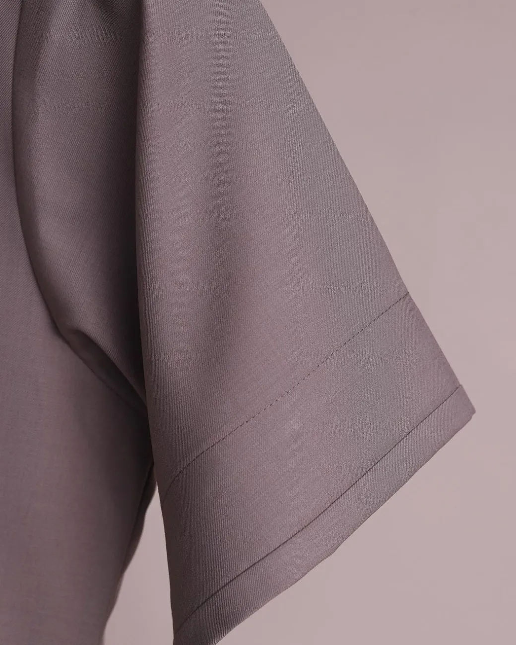 A fossil grey, return front flap with clear view Swarovski button details, short sleeve African senator kaftan native.