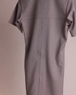 A fossil grey, return front flap with clear view Swarovski button details, short sleeve African senator kaftan native.