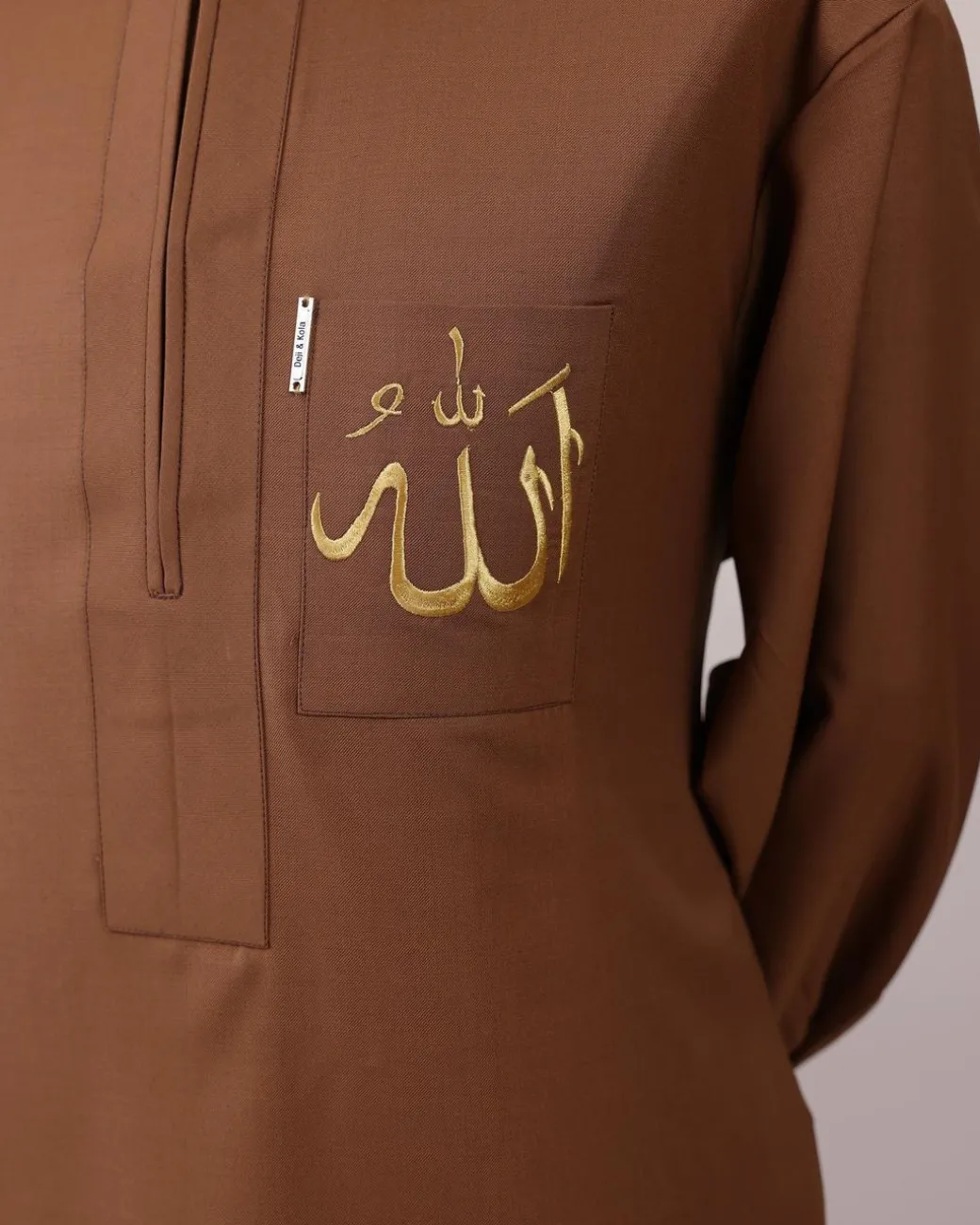 A Gingerbread brown, wide double-lane flap, and embroidery detailing African senator Kaftan native.