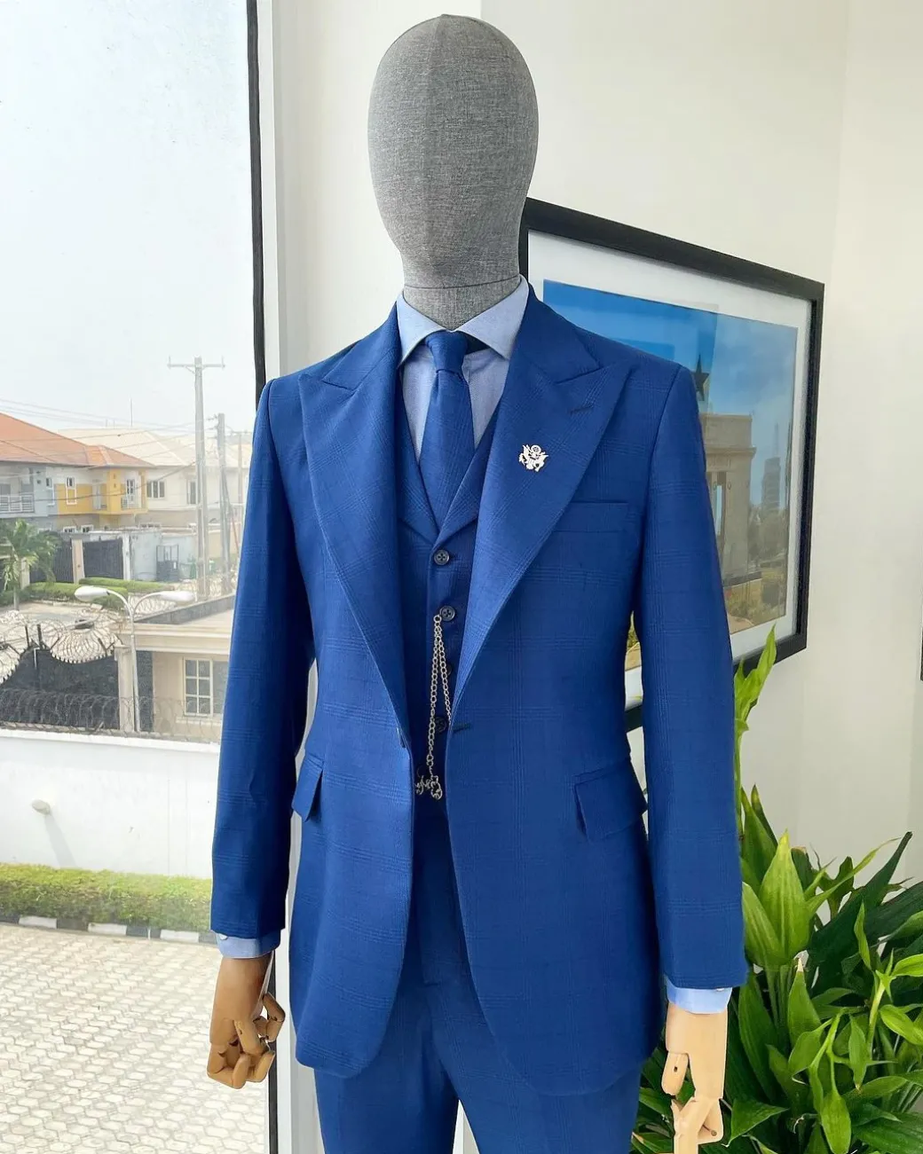 A glen plaid check, lapis blue – nobility – “Board Room” peak lapel suit