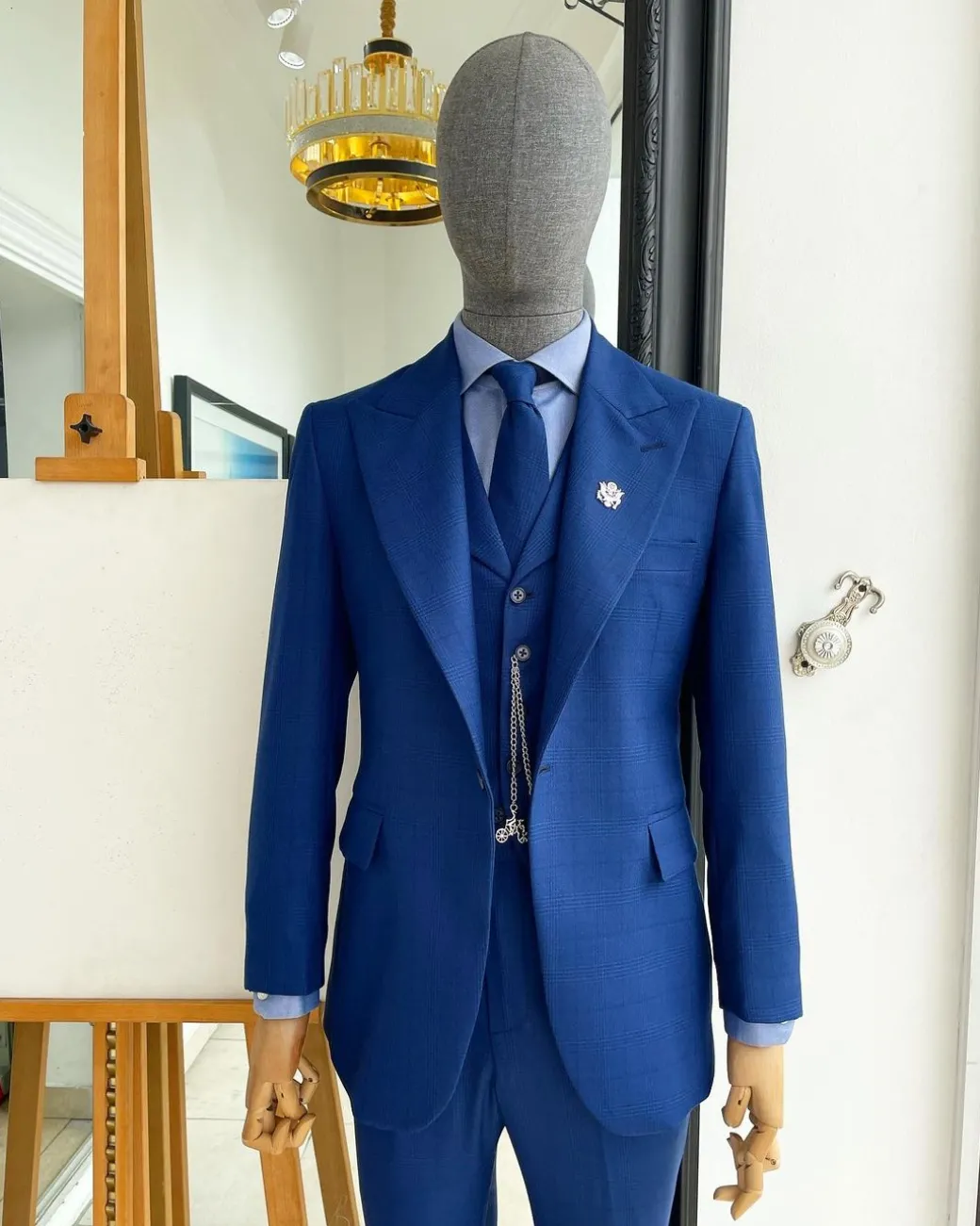 A glen plaid check, lapis blue – nobility – “Board Room” peak lapel suit