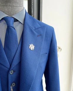 A glen plaid check, lapis blue – nobility – “Board Room” peak lapel suit