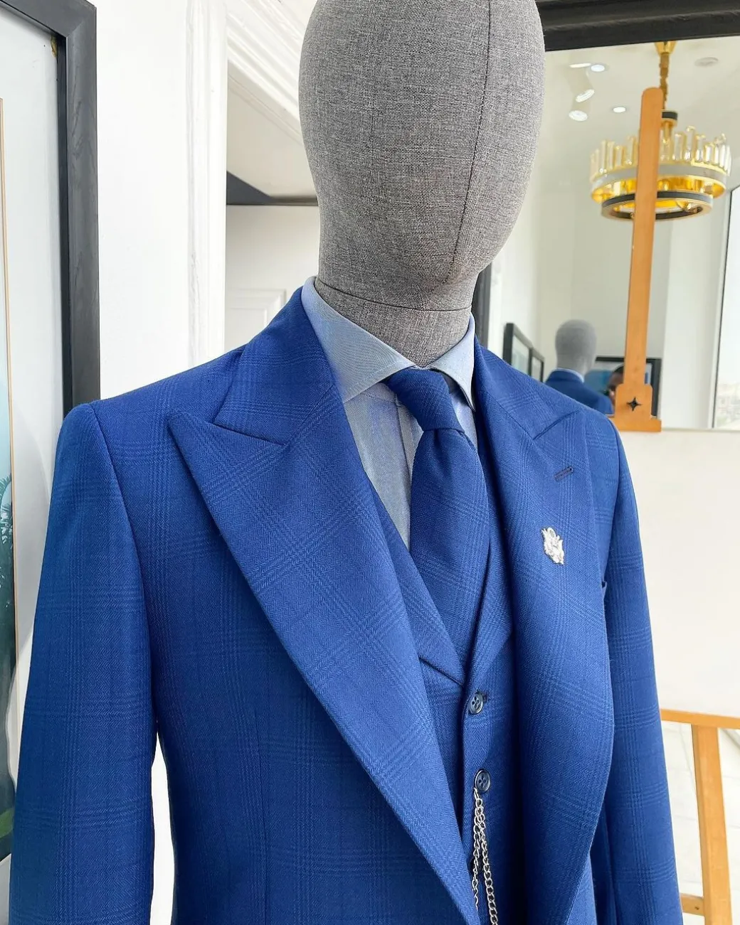 A glen plaid check, lapis blue – nobility – “Board Room” peak lapel suit