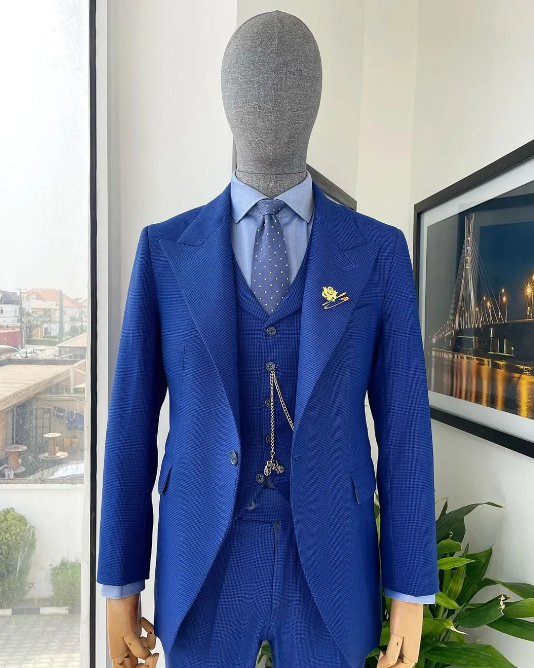 A glen plaid check, lapis blue – nobility – “Board Room” peak lapel suit