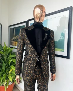 A Gold and black mandarin metallic floral jacquard, peak lapel tuxedo suit.