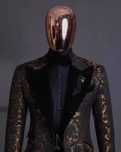 A Gold and black mandarin metallic floral jacquard, peak lapel tuxedo suit.