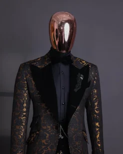 A Gold and black mandarin metallic floral jacquard, peak lapel tuxedo suit.