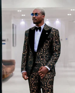 A Gold and black mandarin metallic floral jacquard, peak lapel tuxedo suit