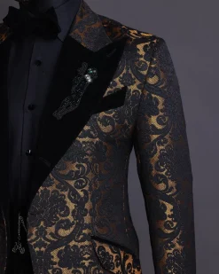 A Gold and black mandarin metallic floral jacquard, peak lapel tuxedo suit.