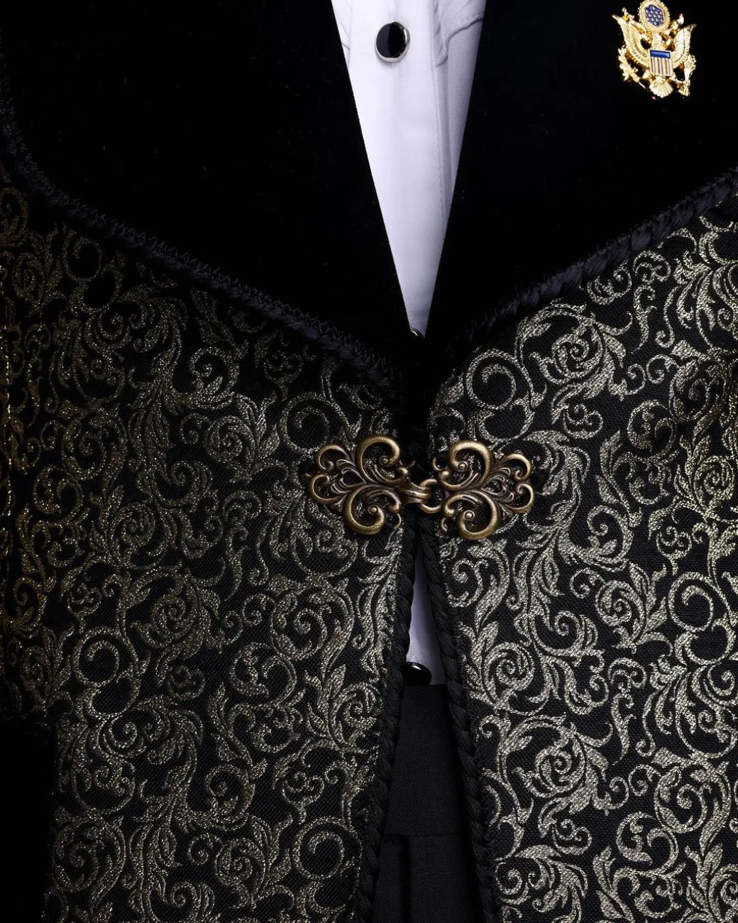 A Gold and black patterned metallic Jacquard tuxedo suit with sharaba wooven edge detailing