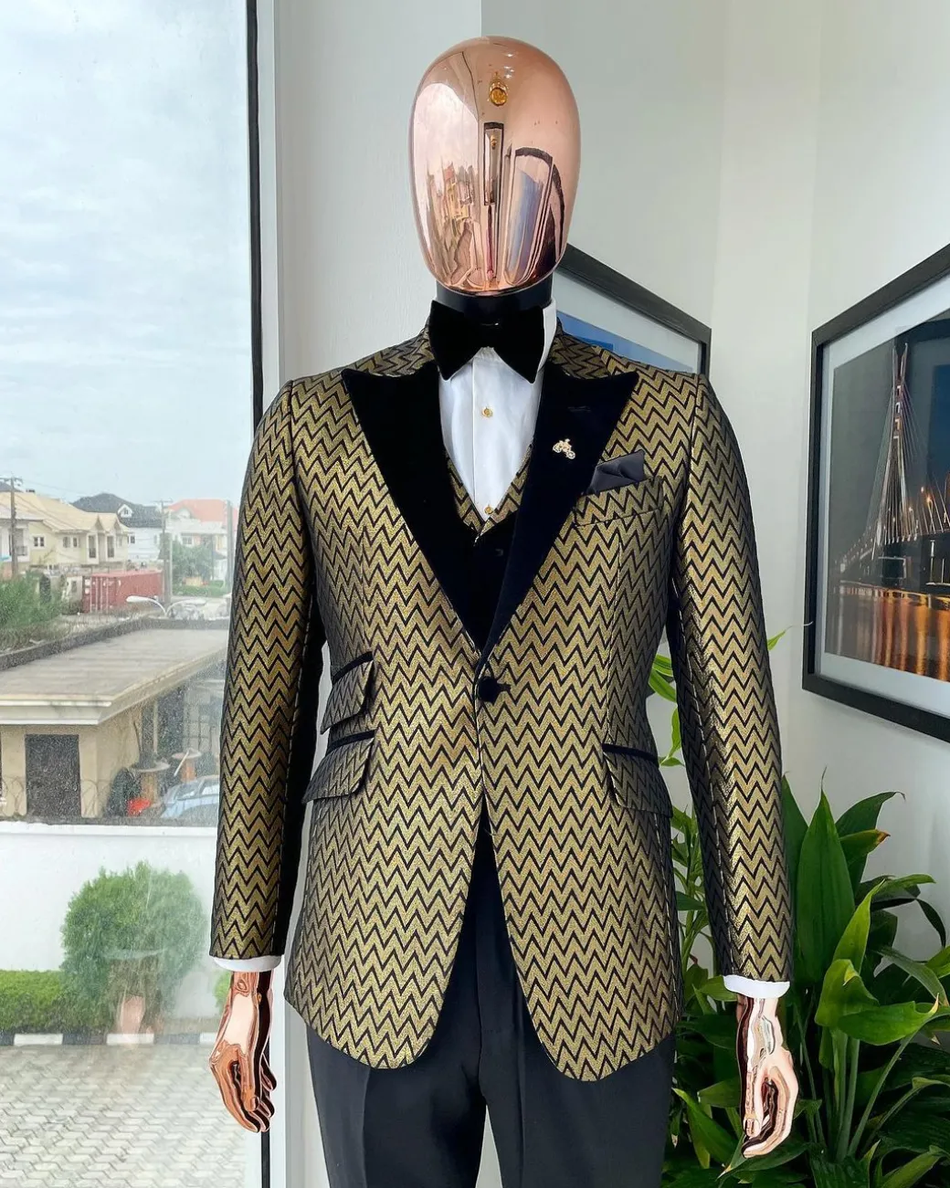 A Gold And Black Zig-Zag Pattern Tuxedo Suit