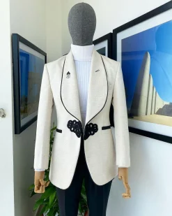 A Gold and ivory “Mandarin” invisible Pattern Ivory white shawl lapel jacquard Suit