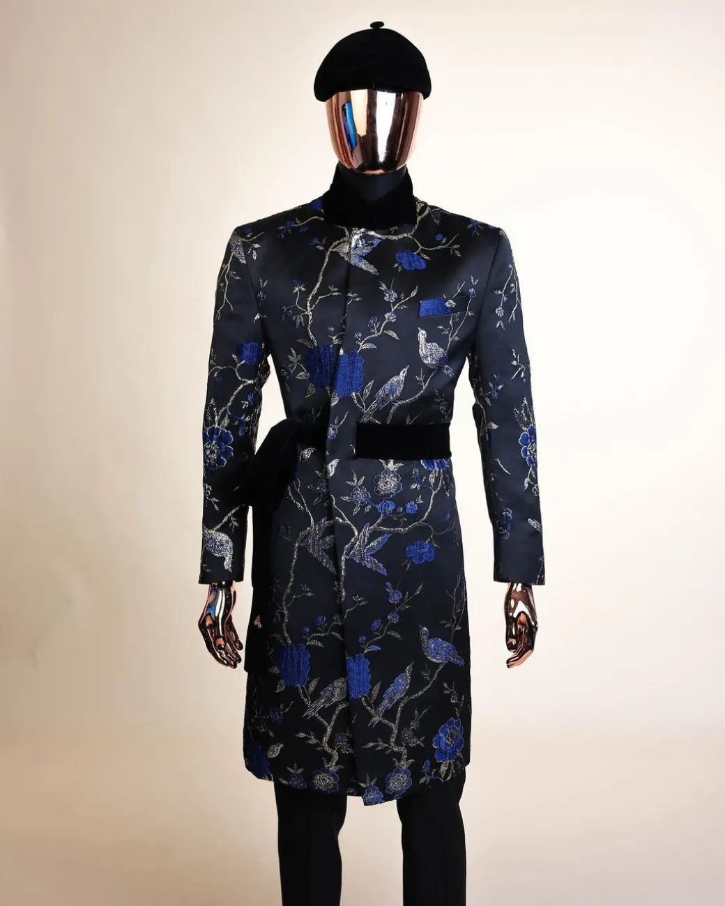 A Gold, black and blue double breasted safari suit, raven and forest metallic pattern jacquard