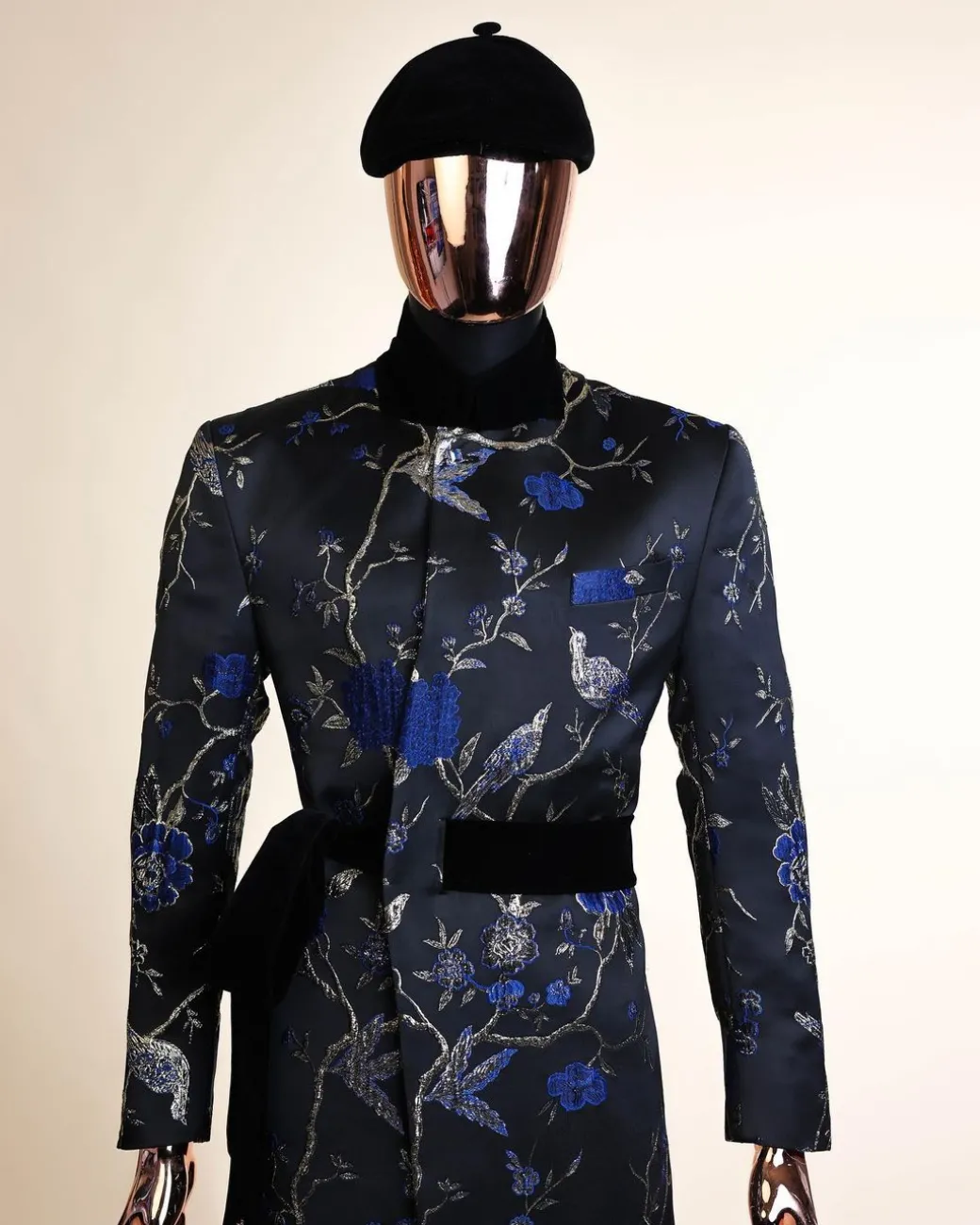 A Gold, black and blue double breasted safari suit, raven and forest metallic pattern jacquard