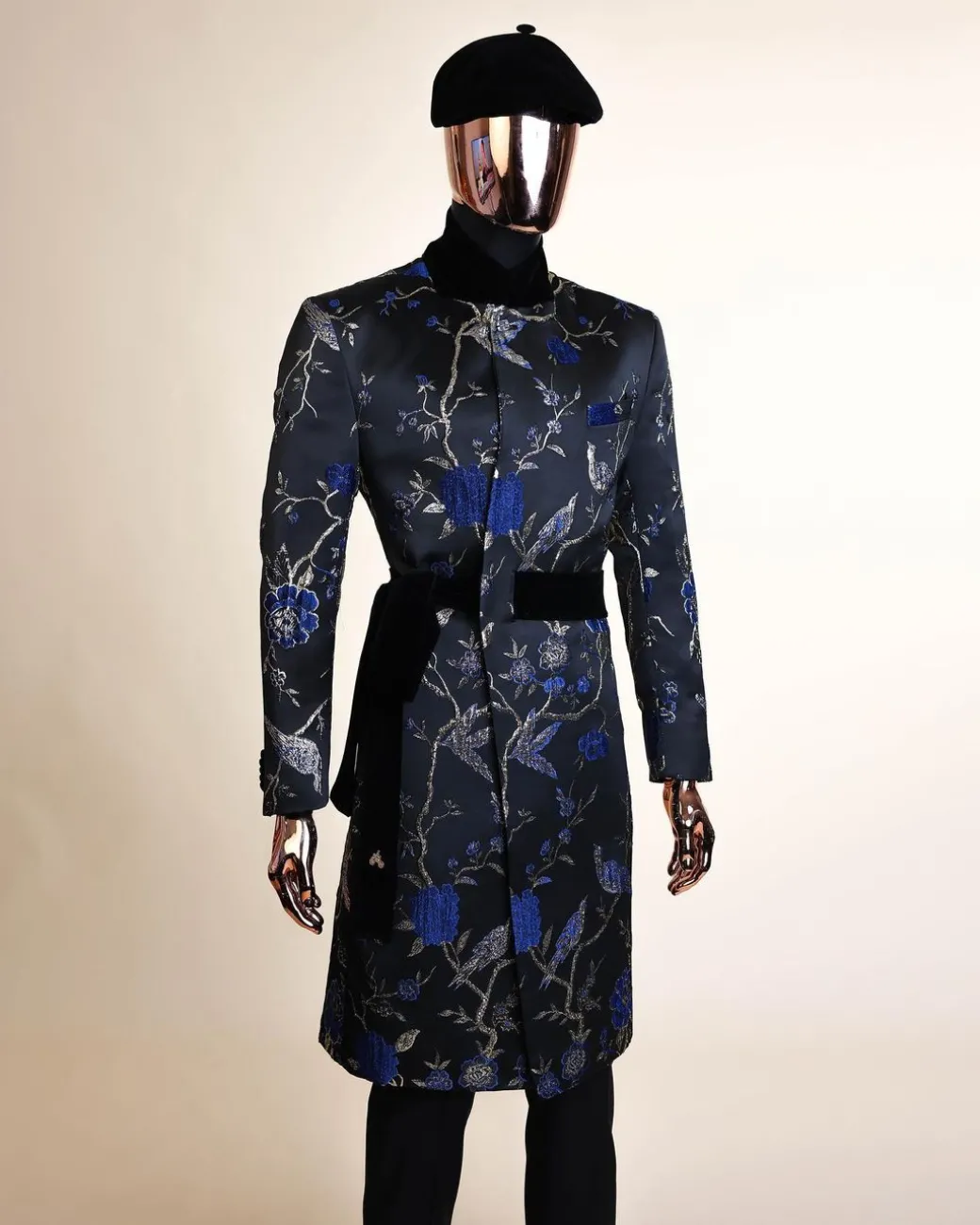A Gold, black and blue double breasted safari suit, raven and forest metallic pattern jacquard