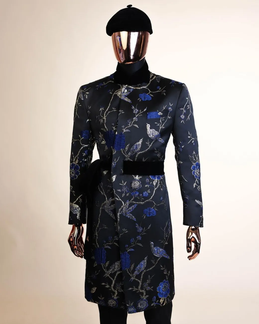A Gold, black and blue double breasted safari suit, raven and forest metallic pattern jacquard